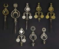 Lot 140 - Eight rare miniature brass and nickel pony harness swingers