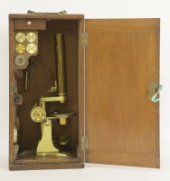 Lot 108 - A brass microscope