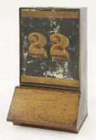 Lot 81 - A Victorian toleware and walnut-mounted shop tea canister
