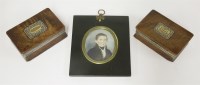Lot 49 - Two oak and silver-lined snuff boxes