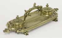 Lot 62 - A brass desk stand