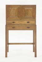 Lot 89 - A Barnsley School walnut and Macassar ebony cabinet