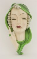 Lot 95 - A Goldscheider pottery wall mask
