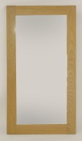 Lot 529 - An oak mirror