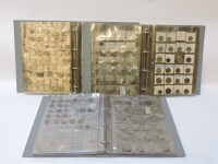 Lot 70 - Three albums of world coins