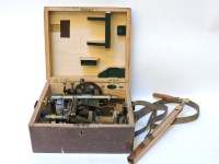 Lot 655 - An early mid 20th century brass and lacquered surveyors level