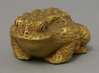 Lot 550 - A gilt wood toad