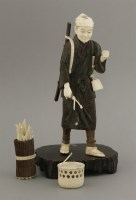 Lot 385 - A composite wood and ivory Woodsman