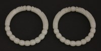 Lot 522 - A pair of jade bangles