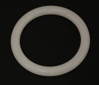 Lot 523 - A white jade bangle