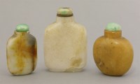 Lot 446 - Three hardstone snuff bottles