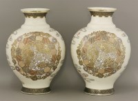 Lot 339 - A pair of cream bodied earthenware Vases