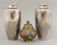 Lot 530 - A pair of silver vases
