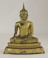Lot 4 - A gilt bronze Buddha