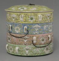 Lot 57 - A set of famille rose Stacking Dishes