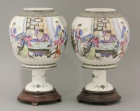 Lot 472 - A pair of porcelain lanterns and stands