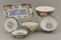 Lot 556 - A pair of Imari bowls and covers
