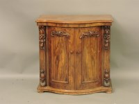 Lot 1566 - A serpentine fronted walnut cabinet