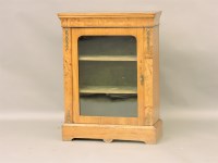 Lot 1617 - A 19th century walnut glazed pier cabinet