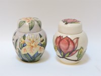 Lot 1201 - Two Moorcroft ginger jars and covers