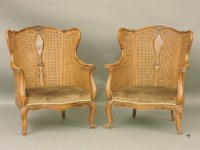 Lot 1552 - A pair of double caned bergere chairs