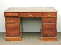 Lot 1567 - A mahogany pedestal desk of nine drawers