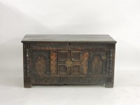 Lot 1560 - An oak coffer