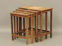 Lot 1530A - A mahogany nest of tables with decorative inlay