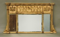 Lot 1558 - A Classical gilt rectangular overmantel mirror