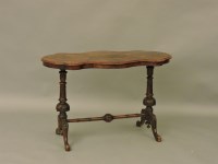 Lot 1572 - A Victorian walnut centre table