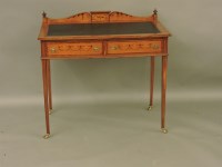 Lot 1624 - A Sheraton Revival satinwood writing table