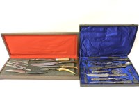 Lot 1157 - An eleven piece carving set
