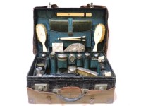 Lot 1195 - A Drew & Son crocodile skin dressing case