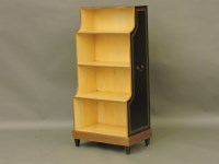 Lot 1574 - A reproduction Regency style waterfall bookcase. 60cm wide x 122cm high
