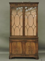 Lot 1529 - A reproduction mahogany display cabinet