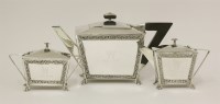 Lot 2 - A Ceylon metalwares three-piece tea set