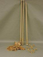Lot 1523 - Three gilt painted wooden curtain poles