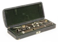Lot 79 - A rosewood three-part six-key flute