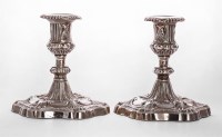 Lot 97 - A pair of George III silver candlesticks