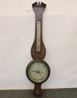 Lot 567 - An inlaid mahogany wheel barometer
