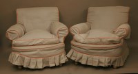 Lot 739 - A pair of Howard style armchairs