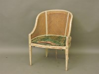 Lot 738 - A painted bergère armchair