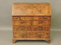 Lot 770 - A walnut bureau