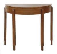Lot 583 - A walnut fold-over card table