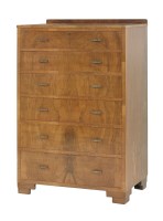 Lot 586 - A walnut chest of six graduated drawers