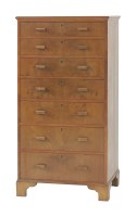Lot 587 - A walnut chest of seven graduated drawers