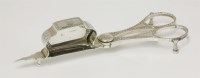 Lot 102 - A pair of George III silver candle snuffers