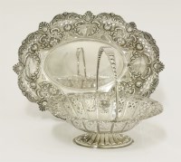 Lot 92 - An Edwardian silver swing-handled sweetmeat basket
