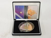 Lot 82 - A 2006 Elizabeth II sea venture nine dollar coin