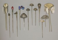 Lot 487 - A collection of eleven hairpins